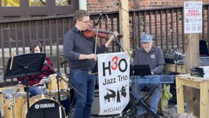 Winona Symphony conductor Dr. Eric Rohde jams with H3O Jazz Trio.