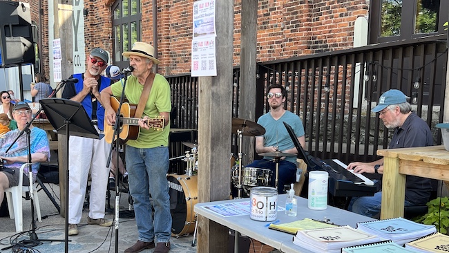 Local legend Jim “Mudcat” Grant entertains the August Jazz Jam crowd with John Carrier on harmonica Wayne Farmer playing the djembe drum.