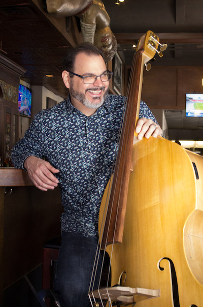 Photo of Chris Bates with upright bass.