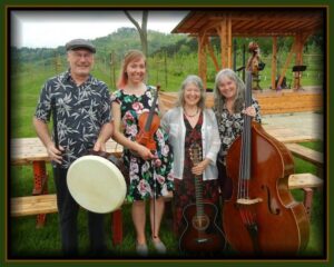 Photo of the members of the band Patina with their instruments.