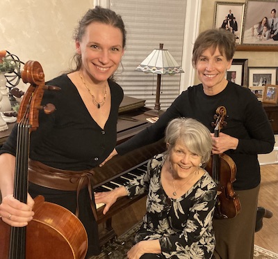 Photo of the members of the Wabasha Street Trio with their instruments.