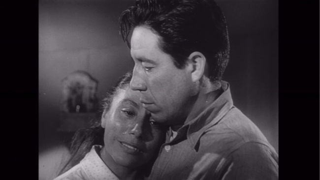 Black-and-white film still showing Juan Chacón and Rosaura Revueltas in Salt of the Earth.
