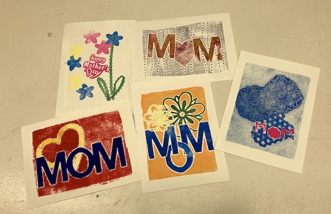 Photo of several monoprinted Mother's Day cards.