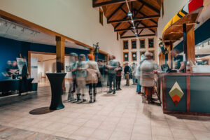 Photo by Bailey Tillman of a New Look Party taking place in the atrium at the Minnesota Marine Art Museum.