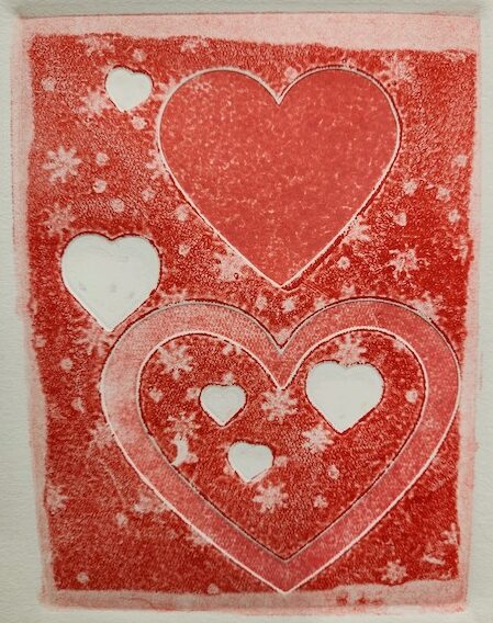 Image of a monoprinted Valentine card, in red, with hearts.