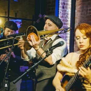 Photo of Miss Myra and The Moonshiners performing.