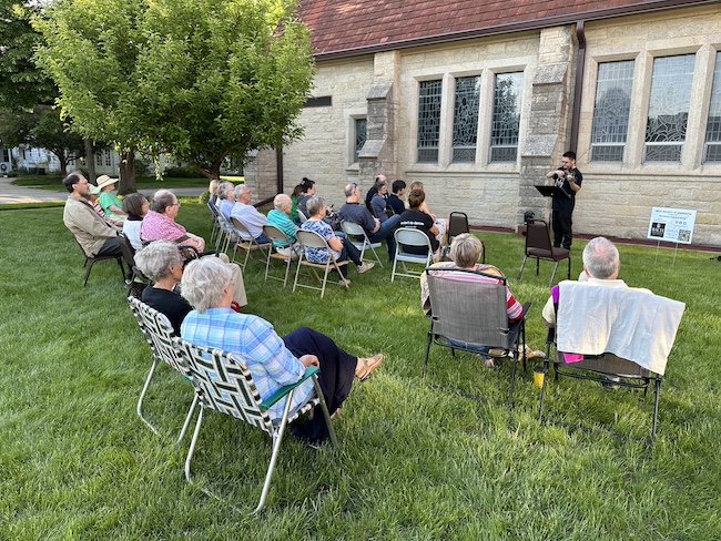 Violinist Marco Real d'Arbelles entertains at 2023 Mini-Concert.