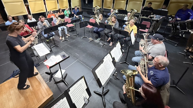 Winona Brass Band rehearsing for their upcoming concert at WMS Auditorium.