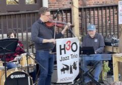 Winona Symphony conductor Dr. Erik Rohde jams with H3O in 2021.