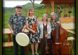 Photo of the members of the band Patina with their instruments.