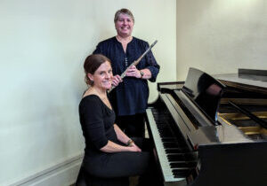 Photo of Heidi Bryant and Meredith Mihm with flute and piano.