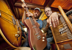 Photo of Mike Munson and Mikkel Beckmen with their instruments.