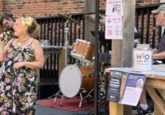 Cat Breet sings with H3O at August Jazz Jam.