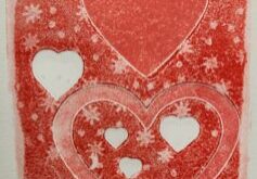 Image of a monoprinted Valentine card, in red, with hearts.