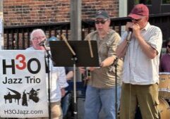 A Winona trio – Margaret Cassidy, Tom Nalli, and John Carrier jamming with H3O in May.