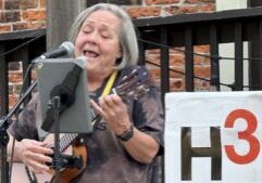 Local ukulele player Kelley Stanage performs “Unchain My Heart” at the September Jazz Jam.