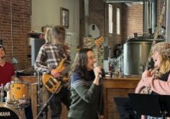 Winona Community HUB director Jackie Henderson (left) jams with H3O and Shelby Lynn.