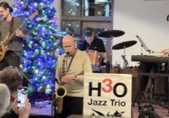 Local jazz legend John Paulson jams with H3O in December.