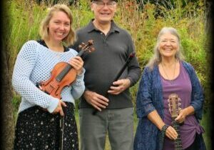 Photo of the three members of the band Patina with their instruments.