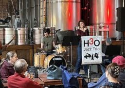 Sandbar Storytelling Festival presenter Regi Carpenter performs with H3O at the October Jazz Jam.