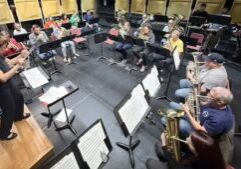 Winona Brass Band rehearsing for their upcoming concert at WMS Auditorium.